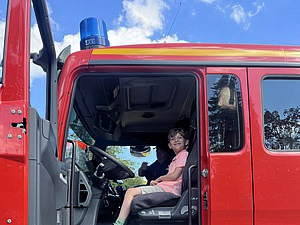 Feuerwehrauto mit Kindern